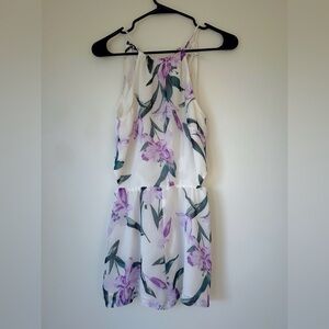 Purple and white floral romper